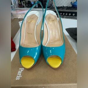 CHRISTIAN LOUBOUTIN
Caraibes/Canari Patent Leather Flo Sling 120 Pumps Size 6/36